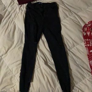 All black pants has some ripped parts